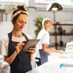 Bakery Owner Looking At Tablet