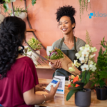 Customer checking out at a flower shop